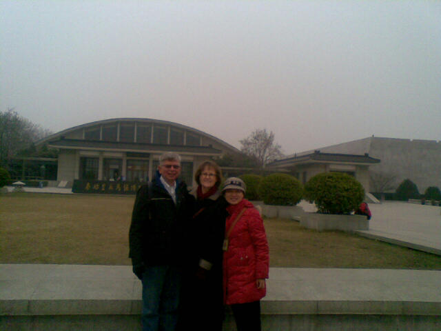 xian travel clients at terracotta army museum posing for picture