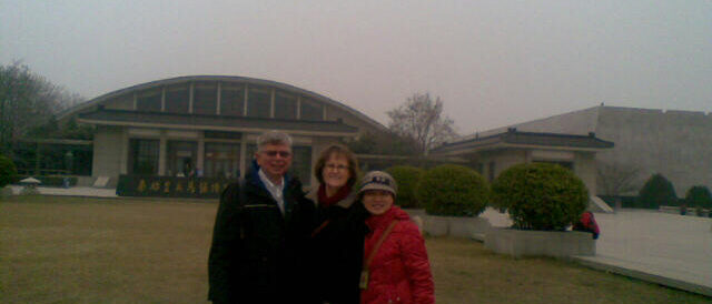 xian travel clients at terracotta army museum posing for picture
